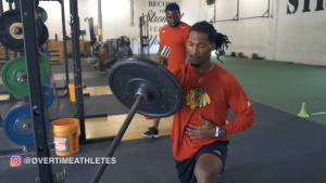 Athlete Performs Landmine Press