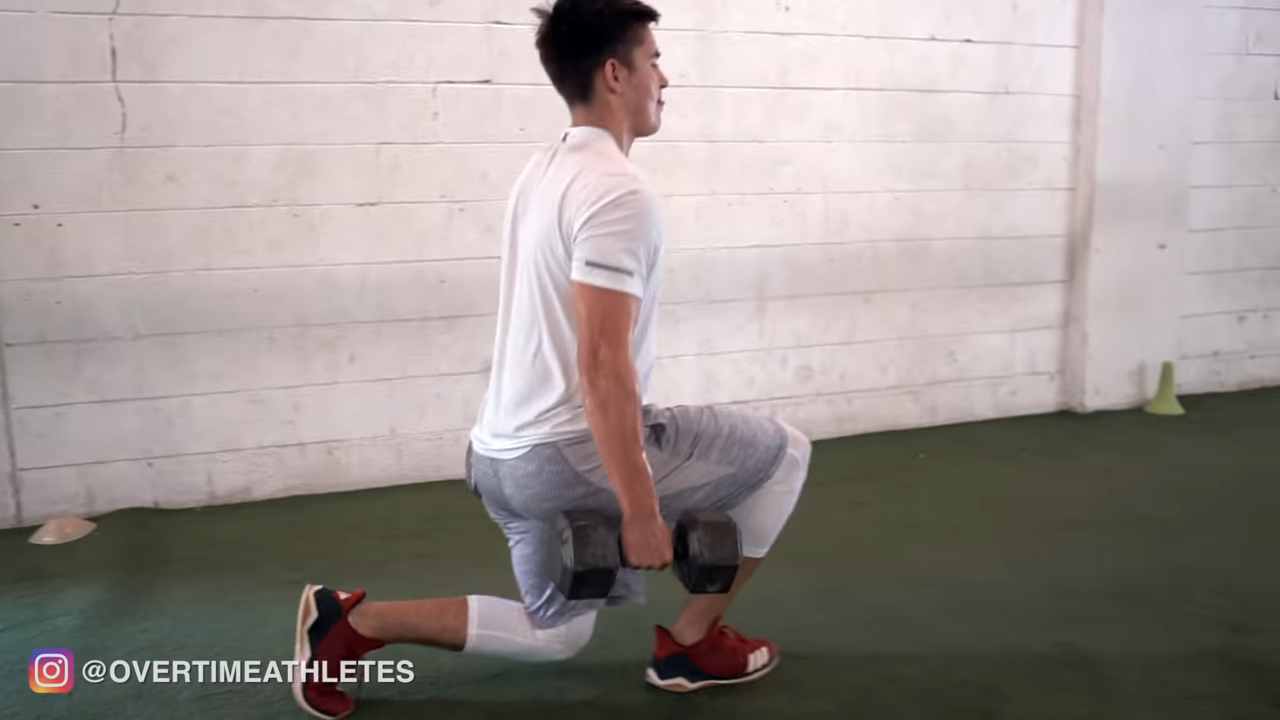 Athlete Performs DB Lunge