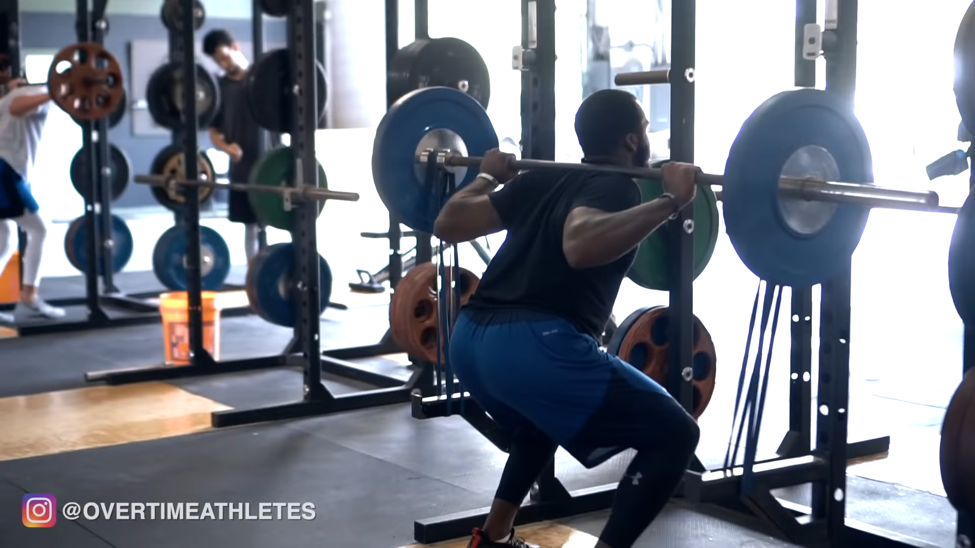 Athlete Performs Banded squat