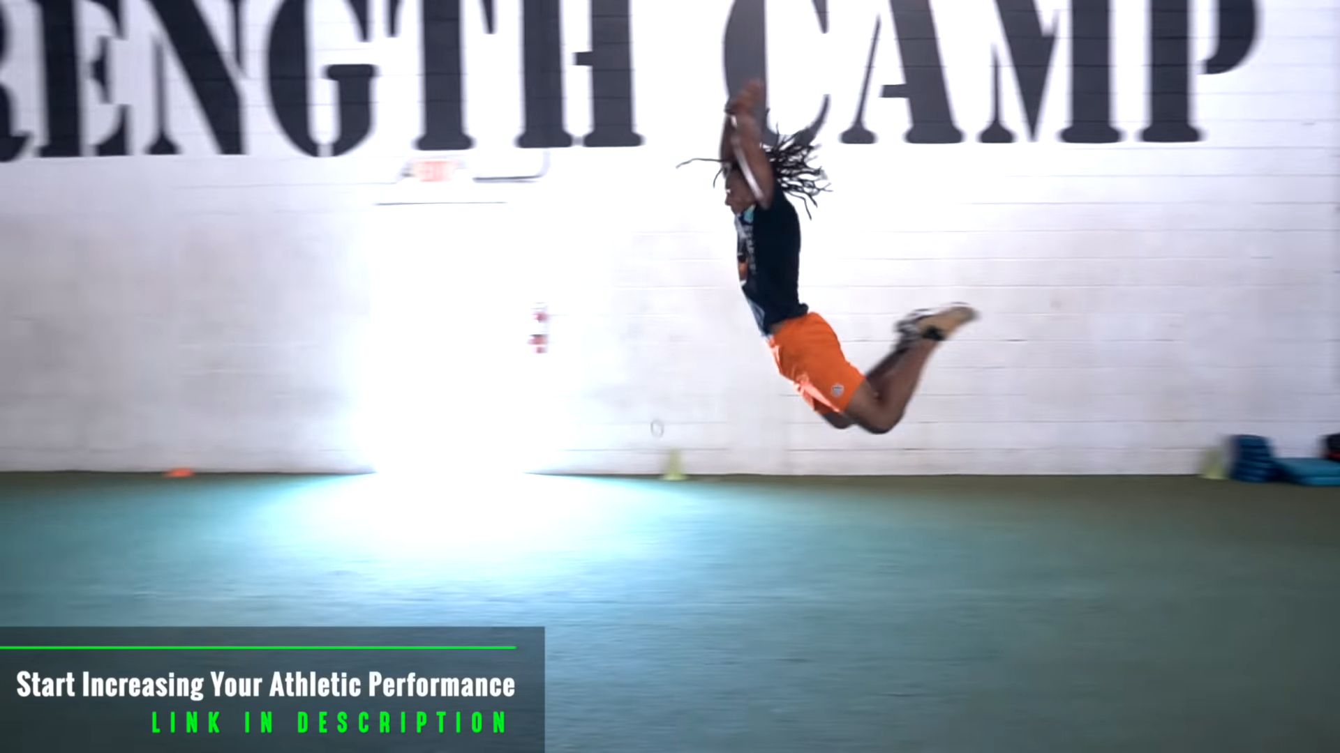 Athlete performs broad jump