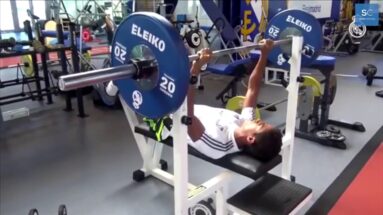 Athlete Performs Bench Press