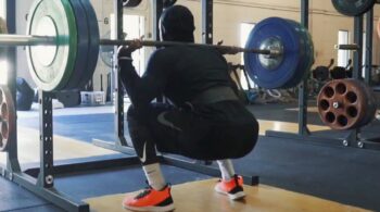 Athlete Performs Back Squat For Strength