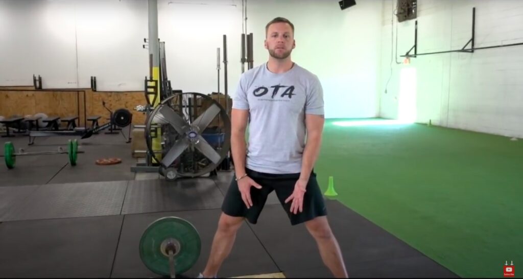 Athlete Sets up for Sumo Deadlift