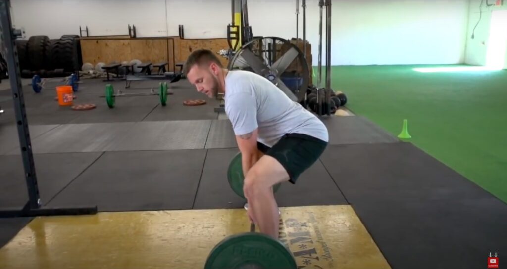 Athlete Performs Sumo Deadlift