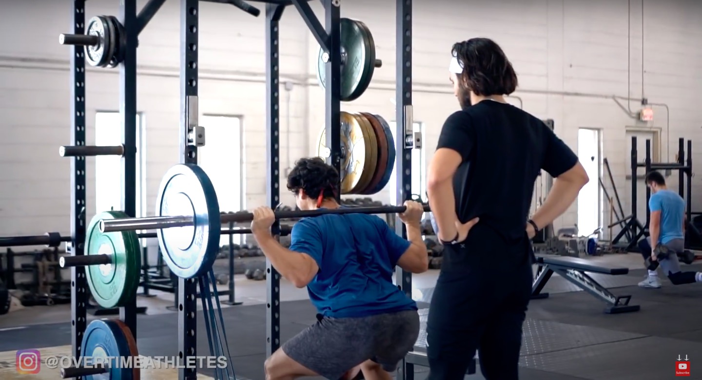 Athlete Performs Barbell Back Squat