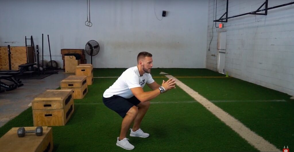 Athlete Performs Drop Squat