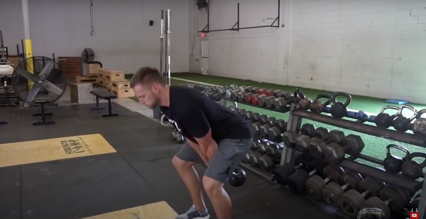 Athlete Performs Kettlebell Swing