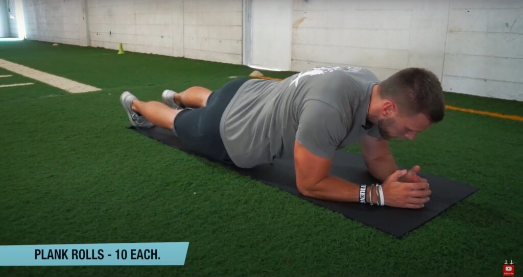 Athlete Performs Plank Rolls