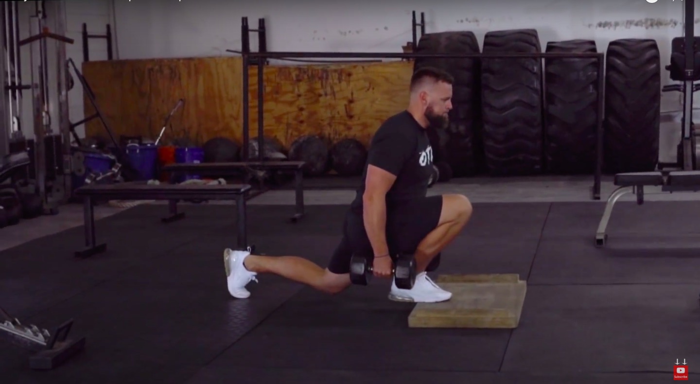 Athlete Performs Elevated Reverse Lunge