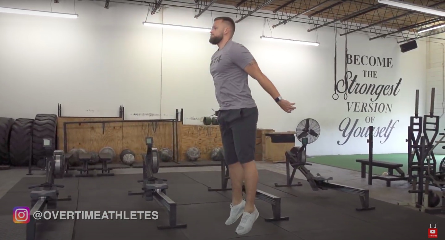 Athlete Performs Squat Jumps