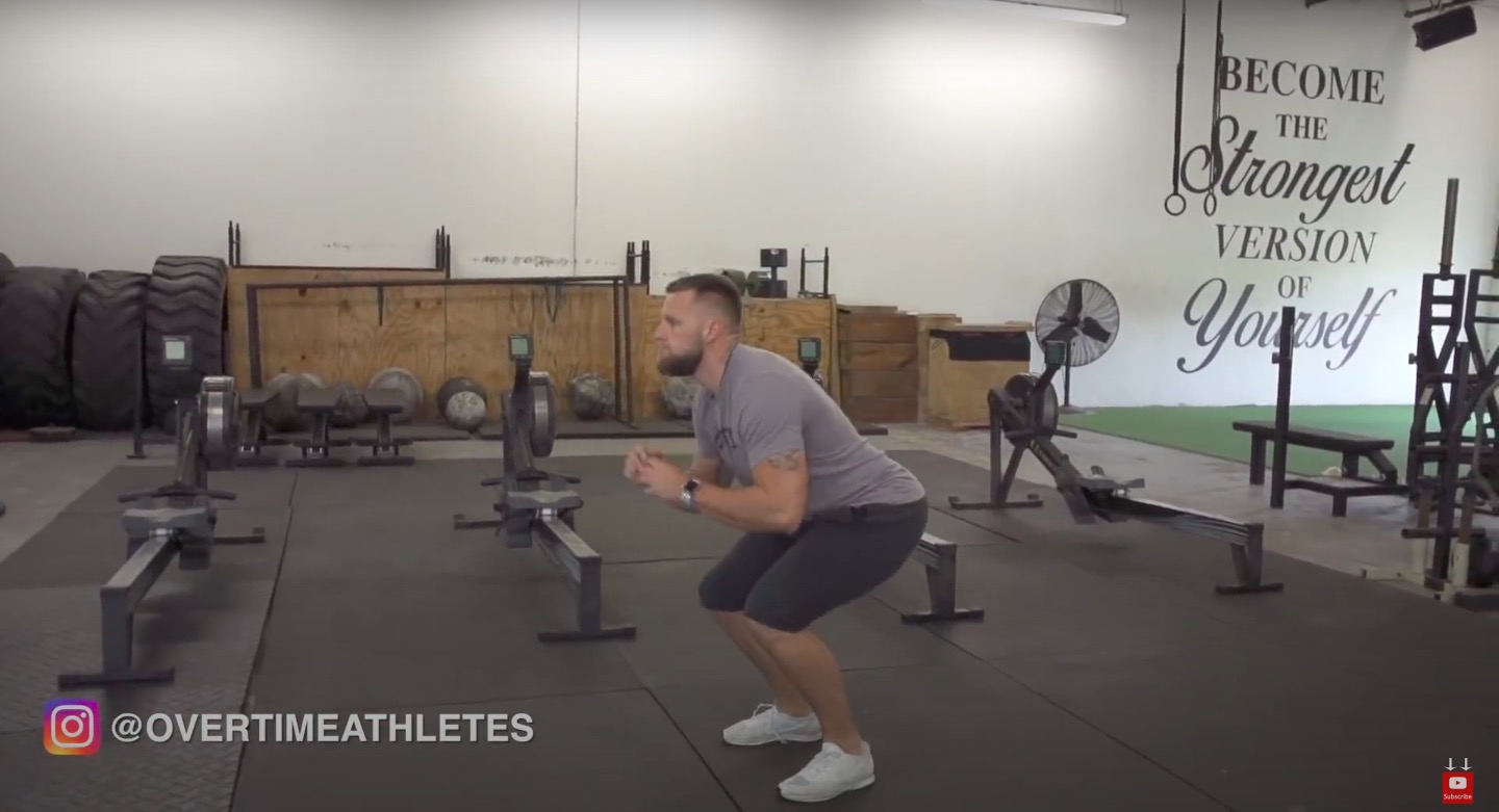 Athlete Performs Squat Jumps