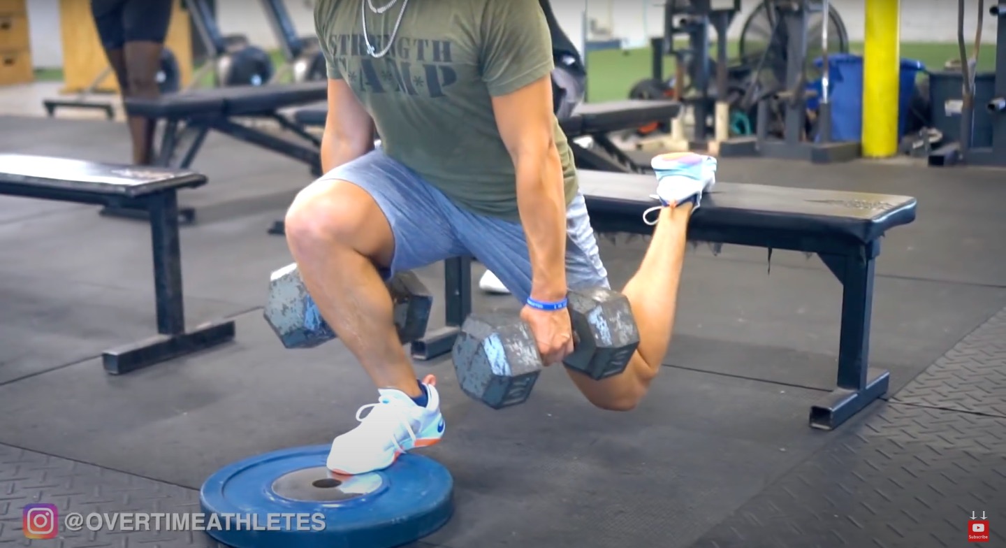 Athlete performs bulgarian split squat