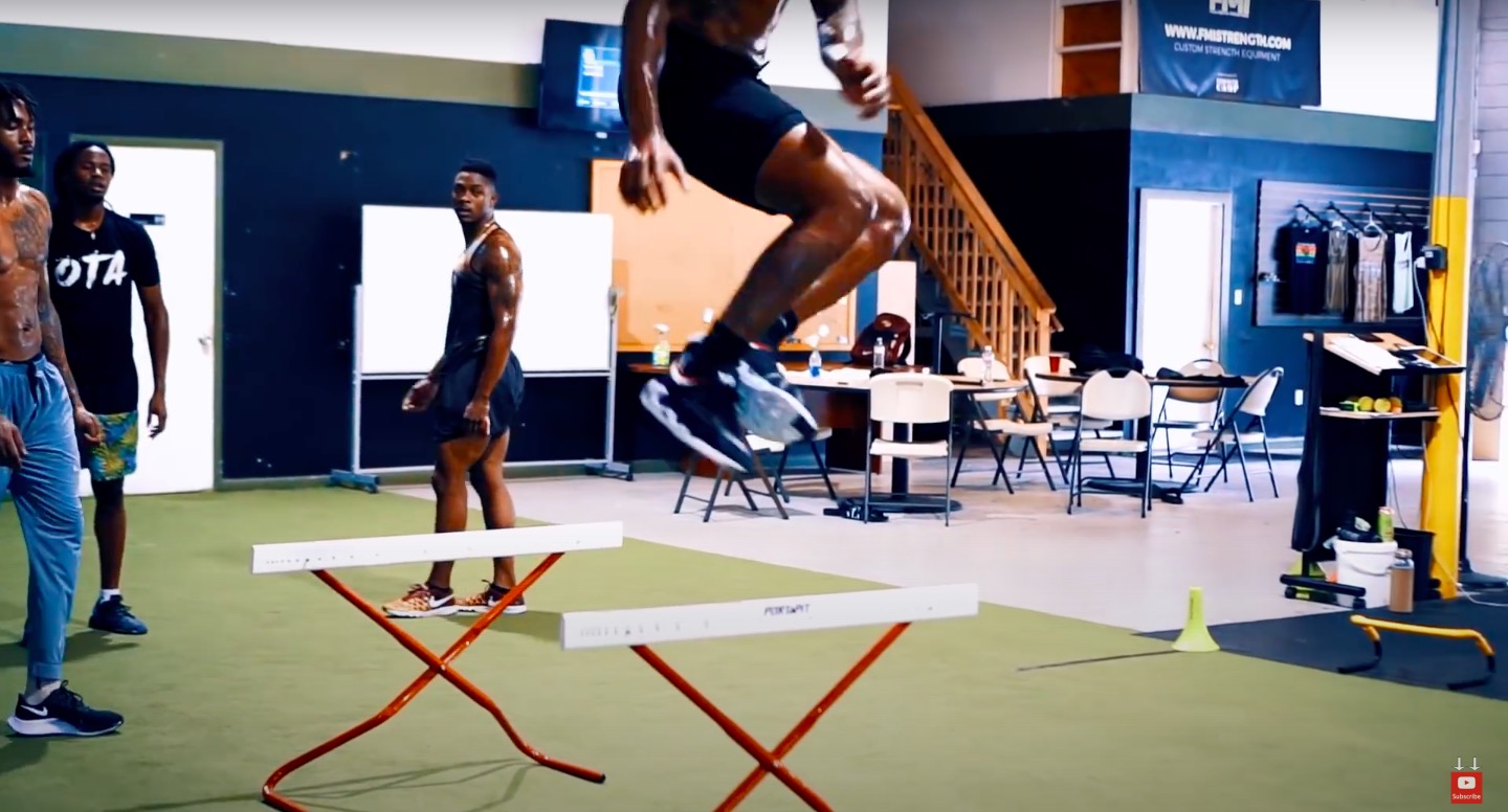 Athlete Performs Flipped Lateral Hurdle Hops